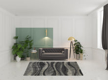 6' X 9' Charcoal Silver And Grey Abstract Shag Power Loom Stain Resistant Area Rug