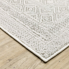 6' X 9' White And Grey Oriental Power Loom Stain Resistant Area Rug
