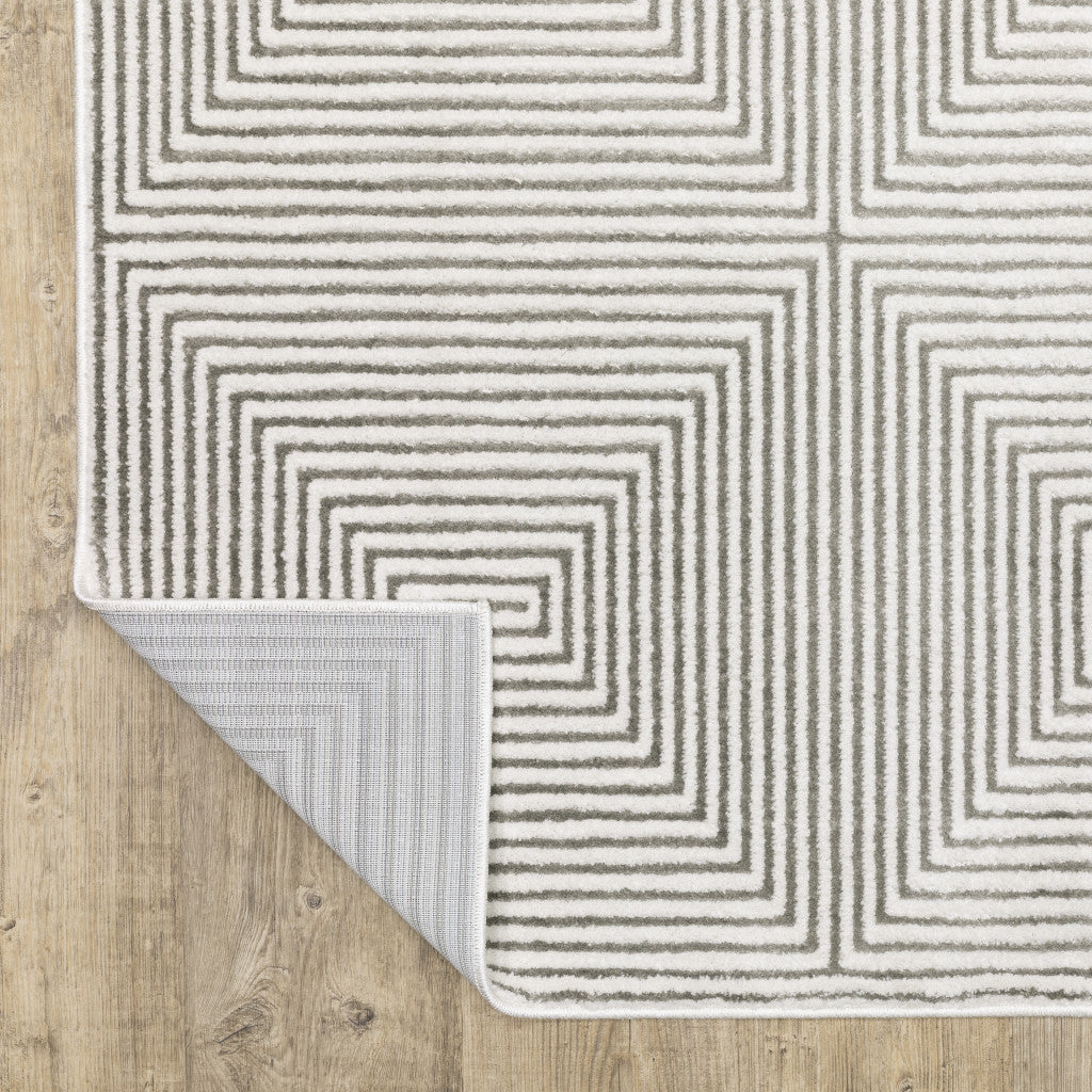 5' X 8' Grey And White Geometric Power Loom Stain Resistant Area Rug
