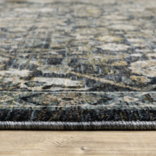 8' X 11' Blue Ivory Grey Gold Green And Brown Oriental Power Loom Stain Resistant Area Rug With Fringe