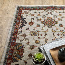 2' X 8' Beige Rust Red Blue Gold And Grey Oriental Power Loom Stain Resistant Runner Rug With Fringe