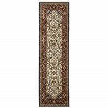 2' X 8' Ivory Beige Red Blue Gold Green And Navy Oriental Power Loom Stain Resistant Runner Rug With Fringe