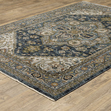 6' X 9' Blue Taupe Grey Green Rust Tan Beige And Gold Oriental Power Loom Stain Resistant Area Rug With Fringe