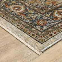 5' X 8' Ivory Beige Blue Orange Gold Green Grey And Rust Oriental Power Loom Stain Resistant Area Rug With Fringe