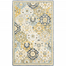 Blue Green Gold Navy And Ivory Geometric Tufted Handmade Stain Resistant Area Rug - 10' x 13'