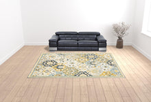 Blue Green Gold Navy And Ivory Geometric Tufted Handmade Stain Resistant Area Rug - 10' x 13'