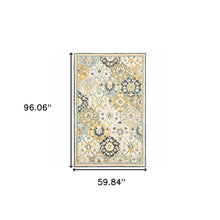 Blue Green Gold Navy And Ivory Geometric Tufted Handmade Stain Resistant Area Rug - 5' x 8'
