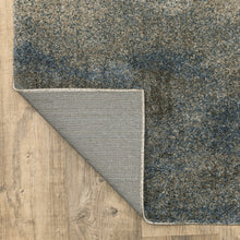 5' X 8' Grey And Teal Blue Abstract Power Loom Stain Resistant Area Rug
