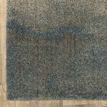 5' X 8' Grey And Teal Blue Abstract Power Loom Stain Resistant Area Rug
