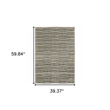 3' X 5' Teal Blue Grey And Tan Geometric Power Loom Stain Resistant Area Rug