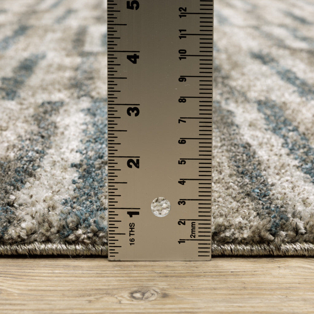 10' X 13' Teal Blue Grey And Tan Geometric Power Loom Stain Resistant Area Rug