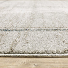 2' X 8' Grey Teal Beige And Tan Geometric Power Loom Stain Resistant Runner Rug