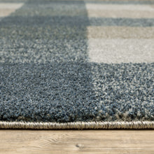 6' X 9' Teal Grey Tan And Beige Geometric Power Loom Stain Resistant Area Rug