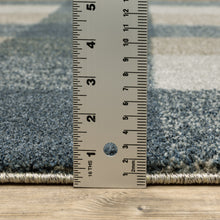 6' X 9' Teal Grey Tan And Beige Geometric Power Loom Stain Resistant Area Rug