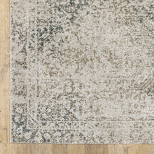 10' X 13' Grey Beige And Teal Oriental Power Loom Stain Resistant Area Rug
