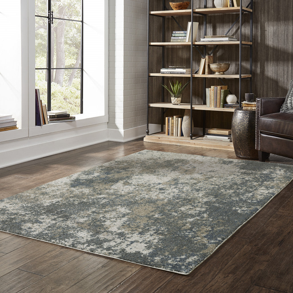 5' X 8' Teal Grey Tan And Beige Abstract Power Loom Stain Resistant Area Rug