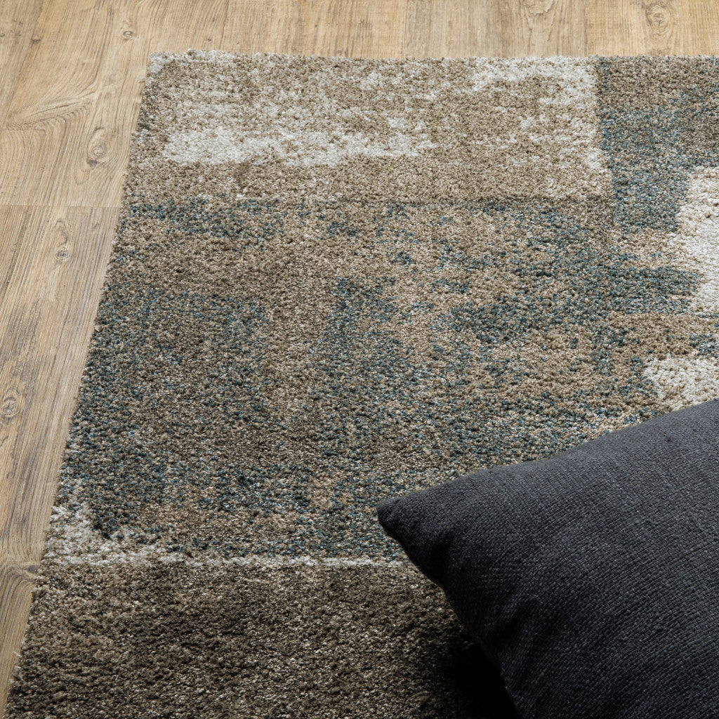 3' X 5' Teal Blue Grey Tan And Beige Geometric Power Loom Stain Resistant Area Rug