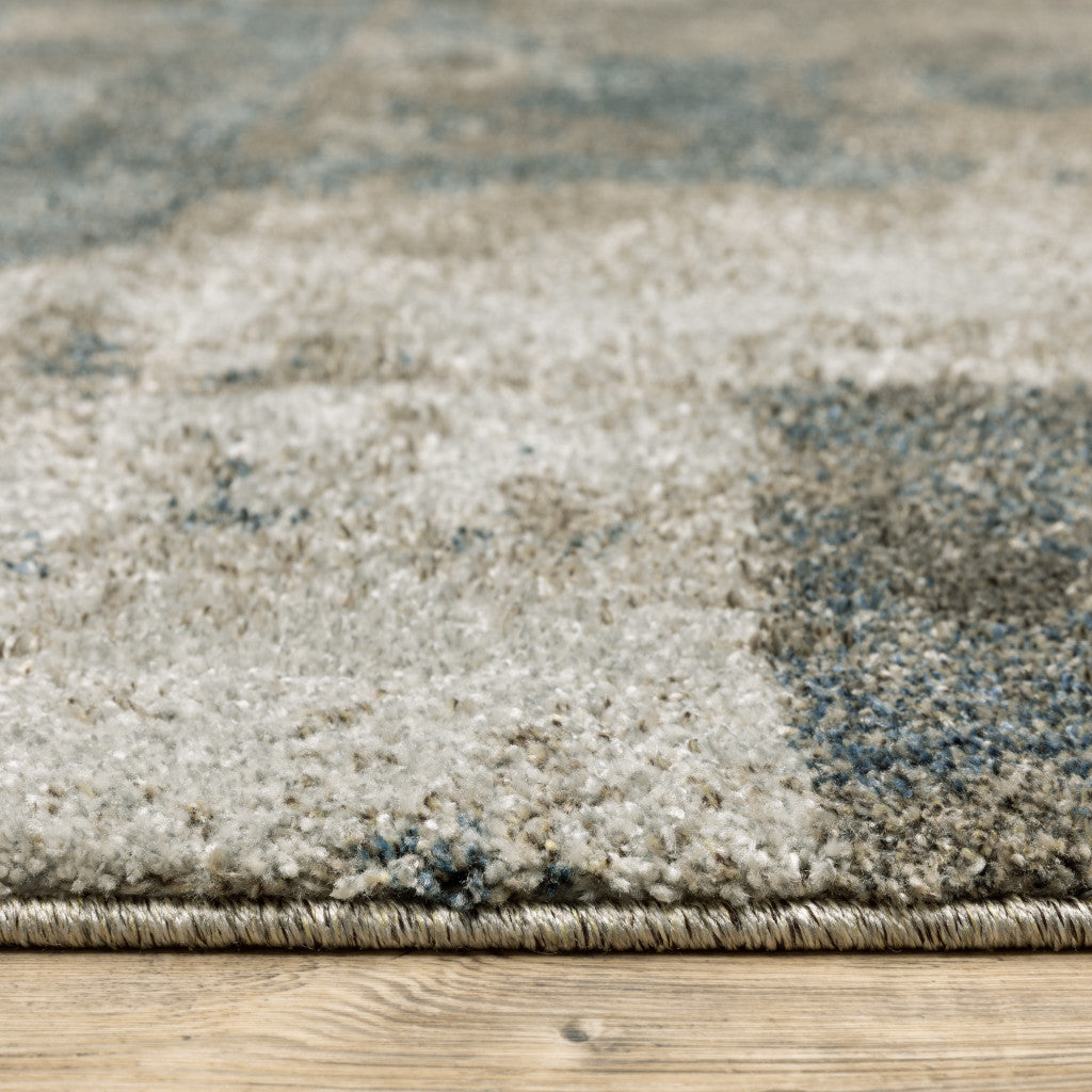 8' X 11' Teal Blue Grey Tan And Beige Geometric Power Loom Stain Resistant Area Rug