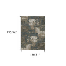 10' X 13' Teal Blue Grey Tan And Beige Geometric Power Loom Stain Resistant Area Rug