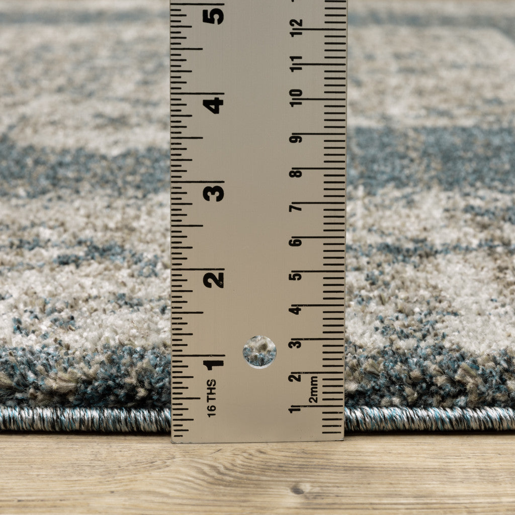 6' X 9' Blue And Beige Oriental Power Loom Stain Resistant Area Rug