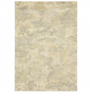 5' X 8' Grey Ivory Beige And Taupe Abstract Power Loom Stain Resistant Area Rug