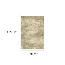 6' X 9' Beige Grey Tan And Gold Abstract Power Loom Stain Resistant Area Rug