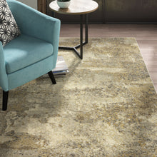 6' X 9' Beige Grey Tan And Gold Abstract Power Loom Stain Resistant Area Rug