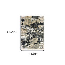 4' X 6' Black Gold Grey And Ivory Abstract Power Loom Stain Resistant Area Rug