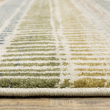 5' X 7' Ivory Blue Green Red And Gold Geometric Power Loom Stain Resistant Area Rug