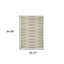 3' X 5' Beige Grey Gold And Green Geometric Power Loom Stain Resistant Area Rug