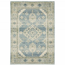 5' X 7' Blue Grey Beige And Teal Oriental Power Loom Stain Resistant Area Rug