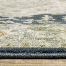 5' X 7' Teal Blue Ivory Green And Grey Oriental Power Loom Stain Resistant Area Rug