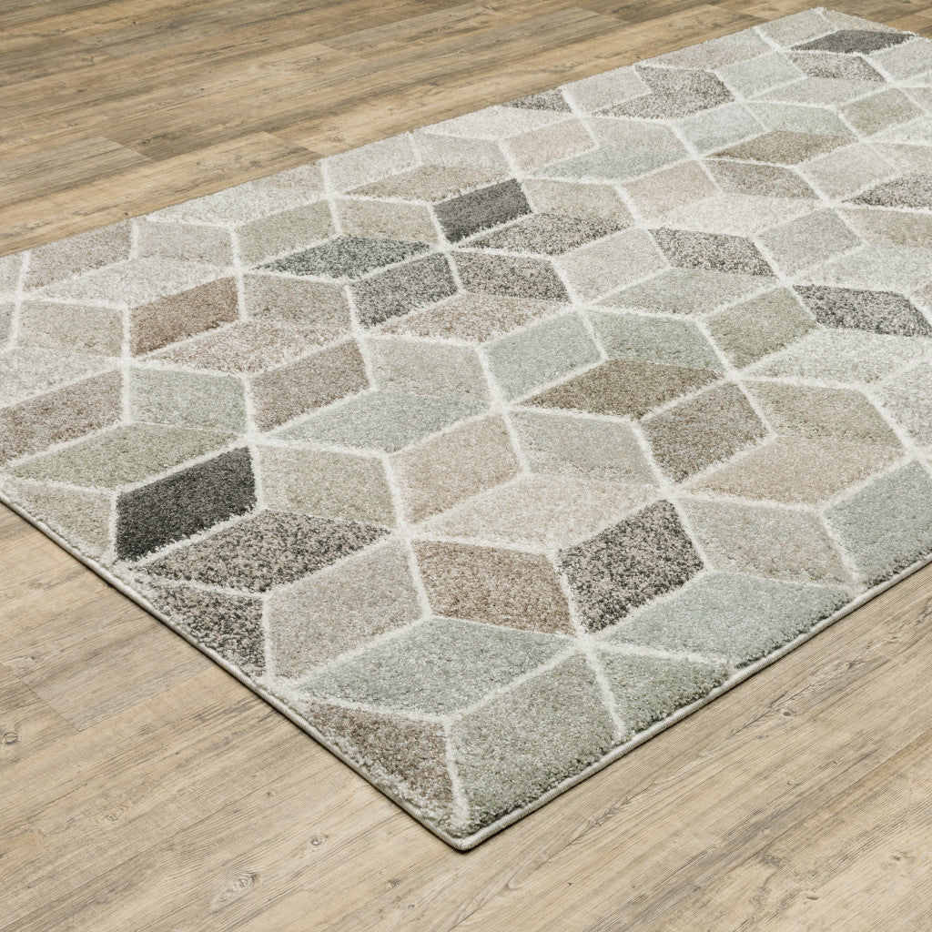 5' X 8' Beige Brown Grey Tan Sage And Pale Blue Geometric Power Loom Stain Resistant Area Rug