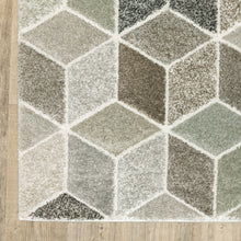 10' X 13' Beige Brown Grey Tan Sage And Pale Blue Geometric Power Loom Stain Resistant Area Rug