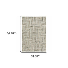 3' X 5' Ivory Beige Grey Brown Pale Blue And Charcoal Geometric Power Loom Stain Resistant Area Rug