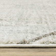 8' X 11' Gray And Ivory Geometric Power Loom Area Rug