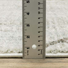 8' X 11' Gray And Ivory Geometric Power Loom Area Rug