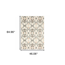 4' X 6' Ivory Pink And Sage Geometric Power Loom Stain Resistant Area Rug