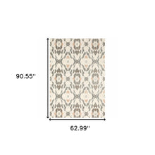 5' X 8' Ivory Pink And Sage Geometric Power Loom Stain Resistant Area Rug