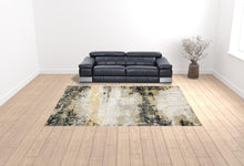 10' X 13' Grey Gold Beige Black And Brown Abstract Power Loom Stain Resistant Area Rug
