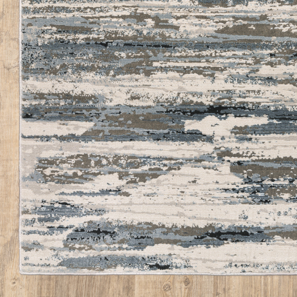 6' X 9' Blue Grey Beige And Brown Abstract Power Loom Stain Resistant Area Rug
