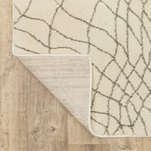 8' X 10' Ivory And Grey Geometric Power Loom Stain Resistant Area Rug