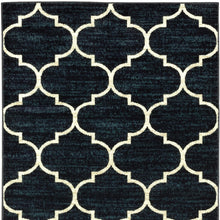5' X 7' Navy And Ivory Geometric Power Loom Stain Resistant Area Rug