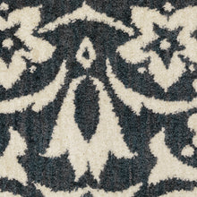 10' X 13' Blue And Ivory Floral Power Loom Stain Resistant Area Rug