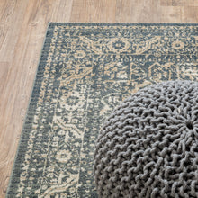 6' X 9' Beige Grey And Blue Oriental Power Loom Stain Resistant Area Rug