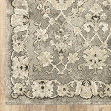 10' X 13' Grey Beige Tan And Brown Oriental Power Loom Stain Resistant Area Rug