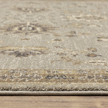 5' X 8' Grey Brown Tan And Beige Oriental Power Loom Stain Resistant Area Rug