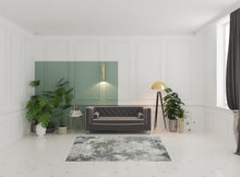 5' X 8' Ivory Grey Blue And Taupe Abstract Power Loom Stain Resistant Area Rug