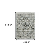 4' X 6' Ivory Grey Charcoal Blue And Taupe Oriental Power Loom Stain Resistant Area Rug