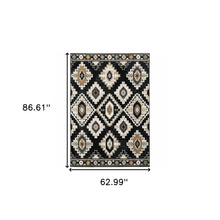 5' X 7' Black Grey Tan Orange And Ivory Southwestern Power Loom Stain Resistant Area Rug